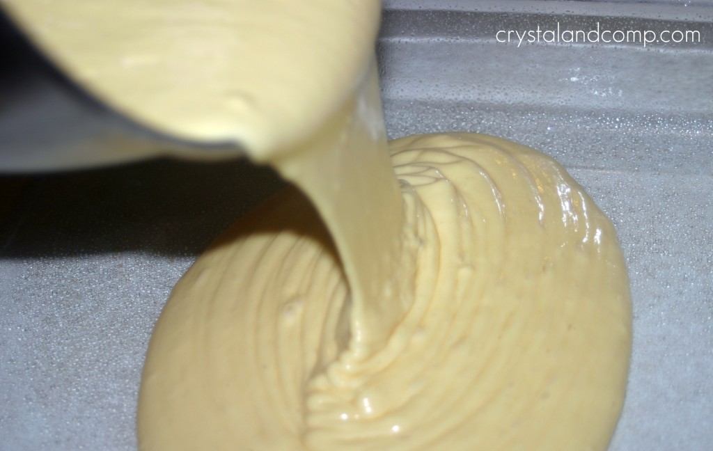 pour cake mix into pan