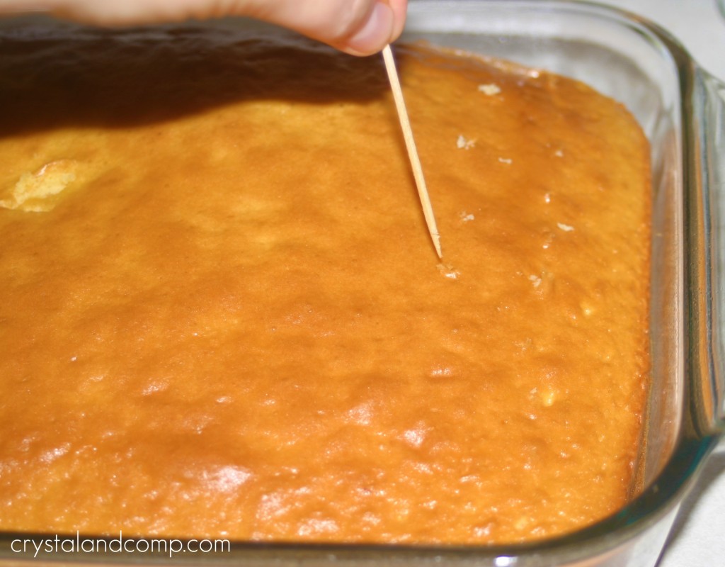 use a toothpick to make holes in the cake