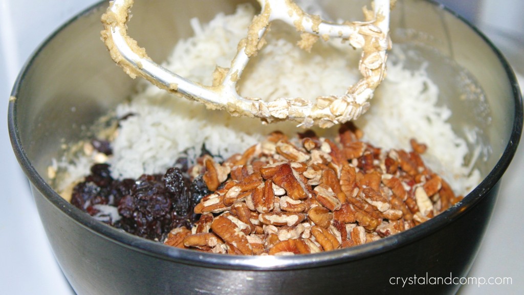 add nuts, flour, raisins and coconut
