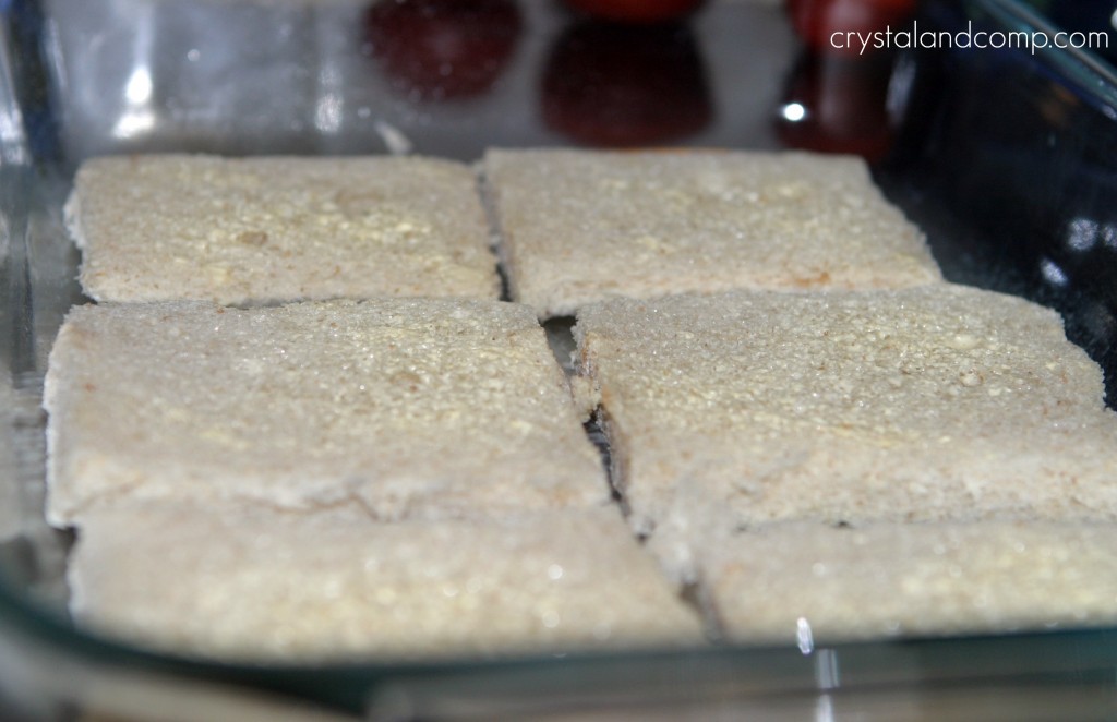 buttered bread in casserole dish