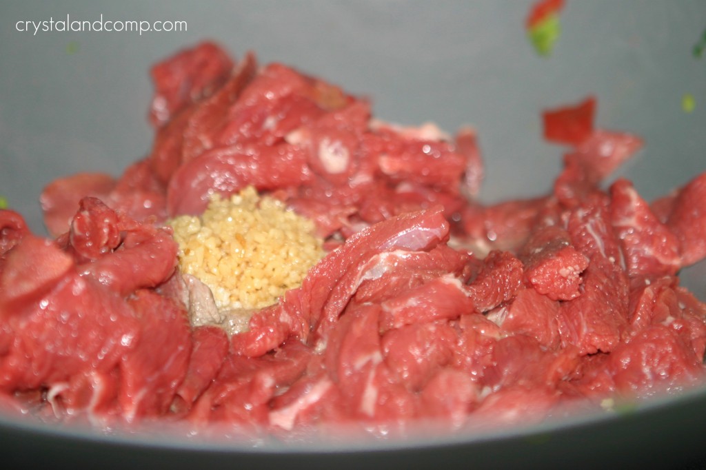 add sliced beef to wok