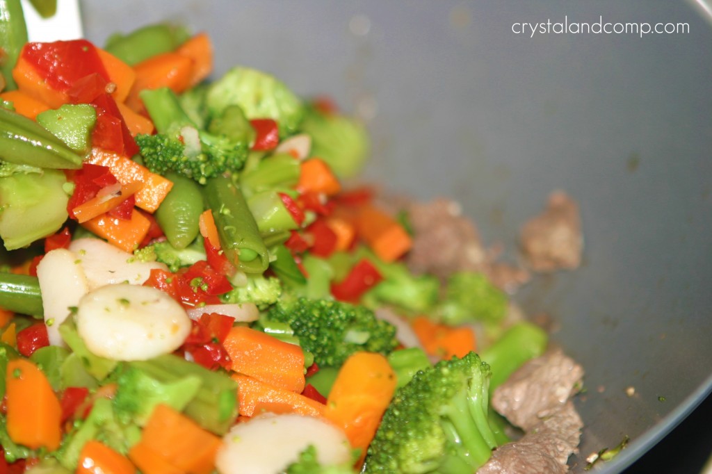 add veggies back to wok