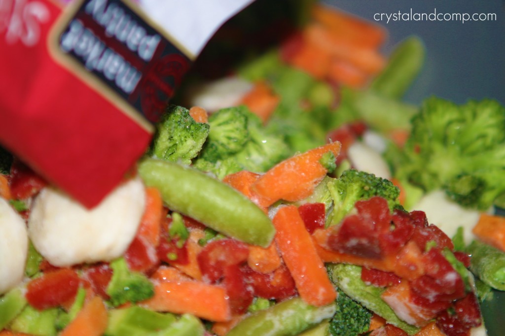 add veggies to wok