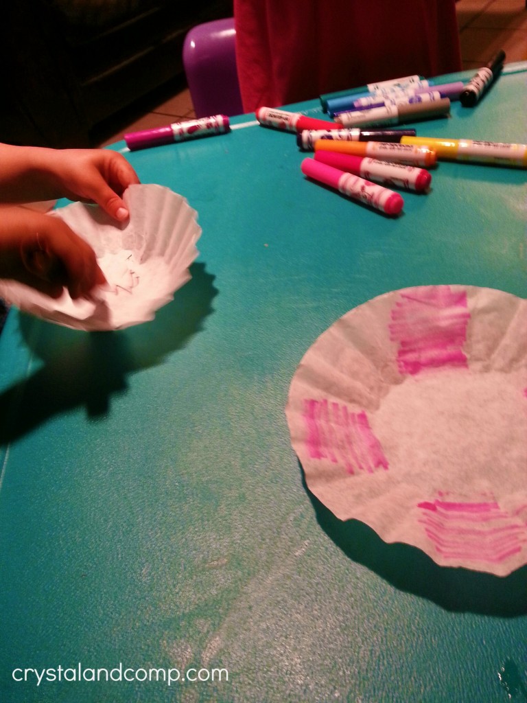 use markers to color in coffee filters to then make paper flowers