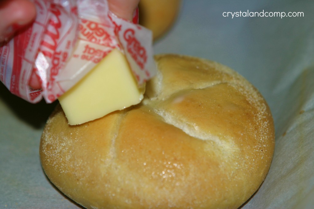 add butter to the tops of the Schwans rolls